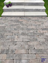 Traptrede 100x35x15 cm stone grey kleurecht met facet